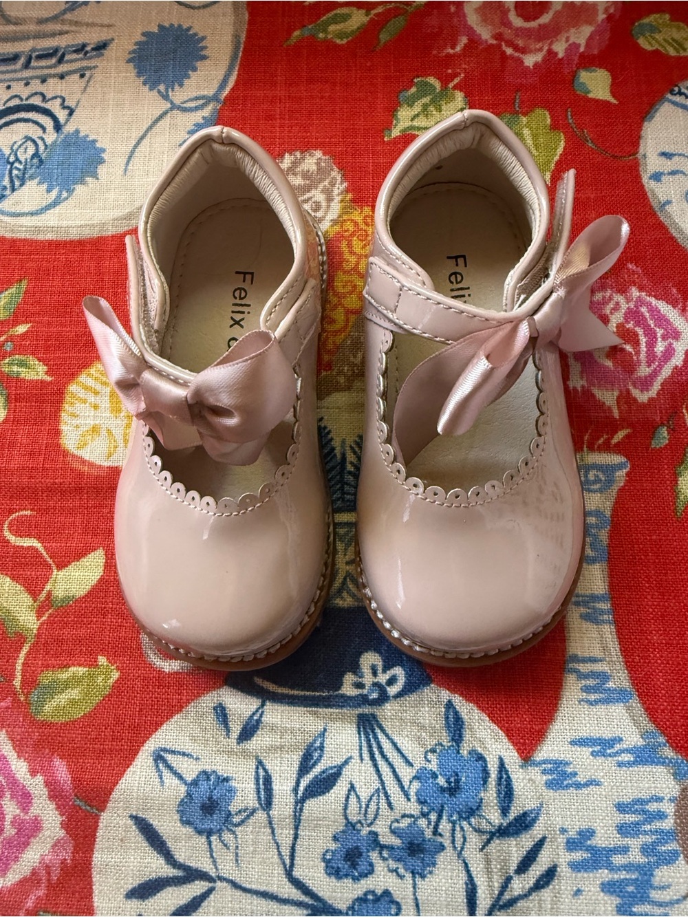Felix and Flora patent bow shoes